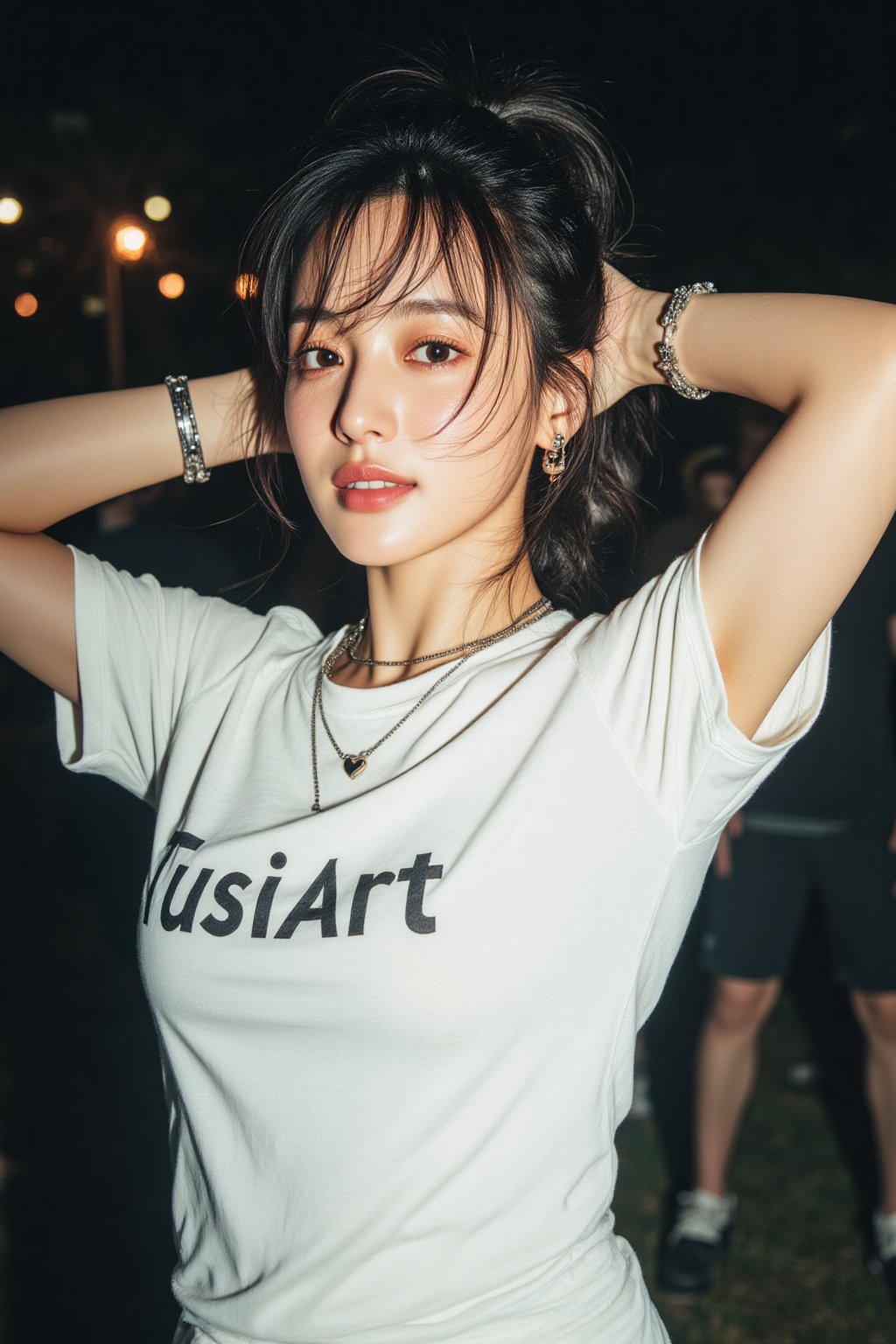 a woman with long dark hair,  High ponytail,  wearing a white long T-shirt with the words "TuSiArt" in black letters. She...