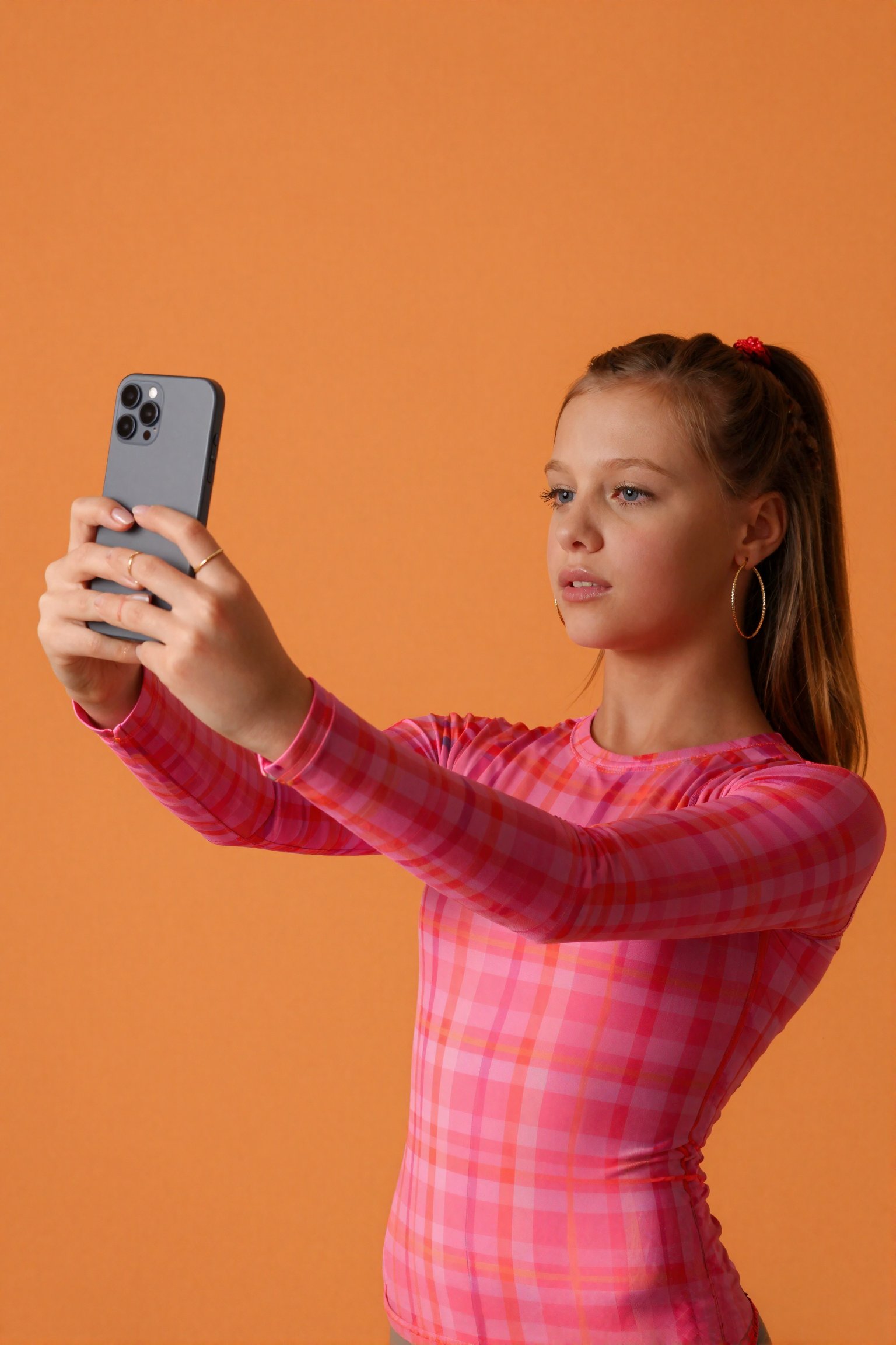 A vibrant fashion editorial scene of a 16 year old girl taking a selfie,  right-side portrait orientation with the subject...