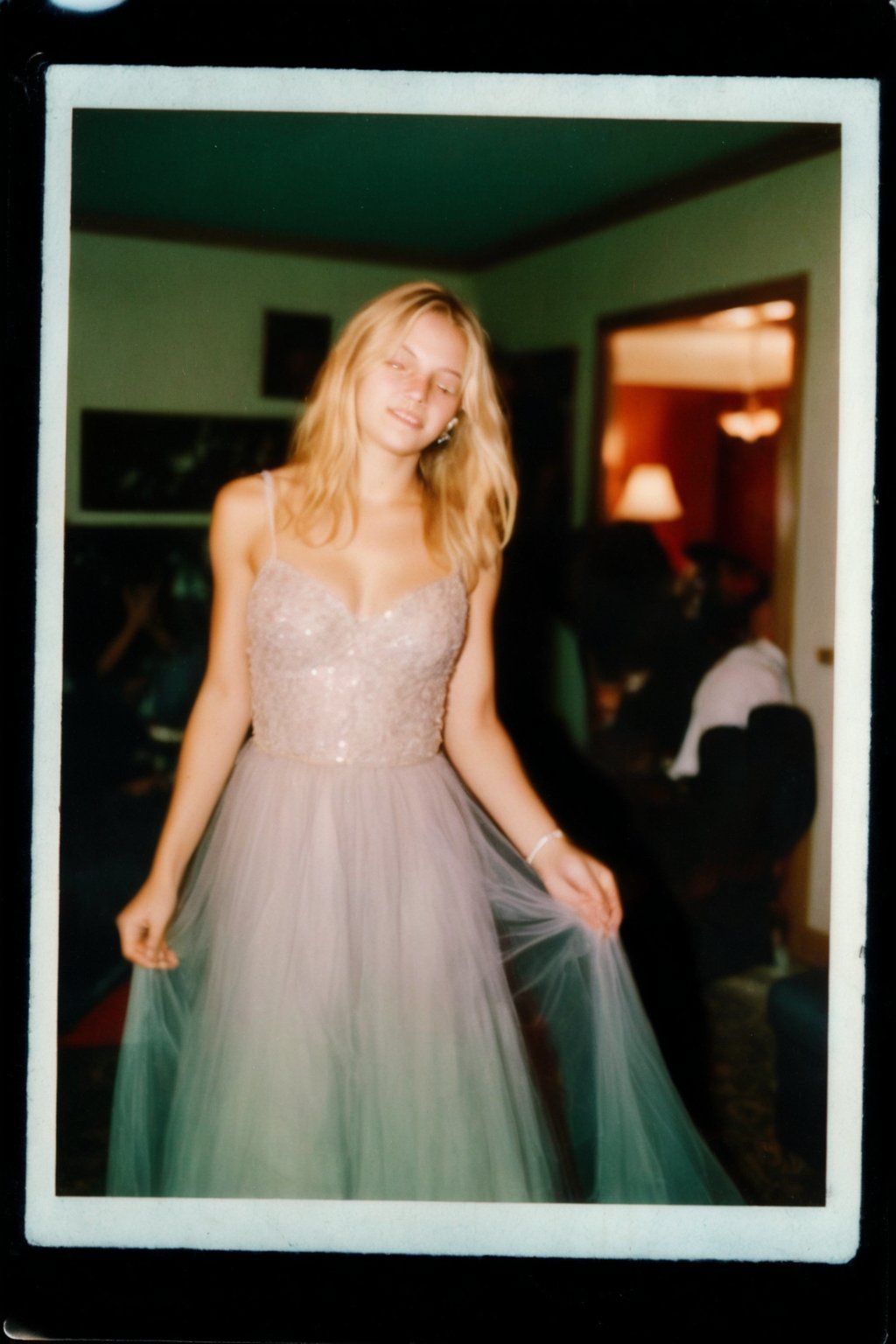 A nostalgic Polaroid photograph captures a candid moment of a stunning blonde teenager, dressed in a flowing prom gown, swaying drunkenly to an unheard melody in her family's loungeroom. The white border and grainy film texture evoke a sense of analog nostalgia. The camera zooms in for a close-up full-body shot, showcasing the girl's bleary-eyed expression as she loses herself in the music. Onlookers, blurred in the background, seem mesmerized by her carefree abandon under the dim lighting of midnight.