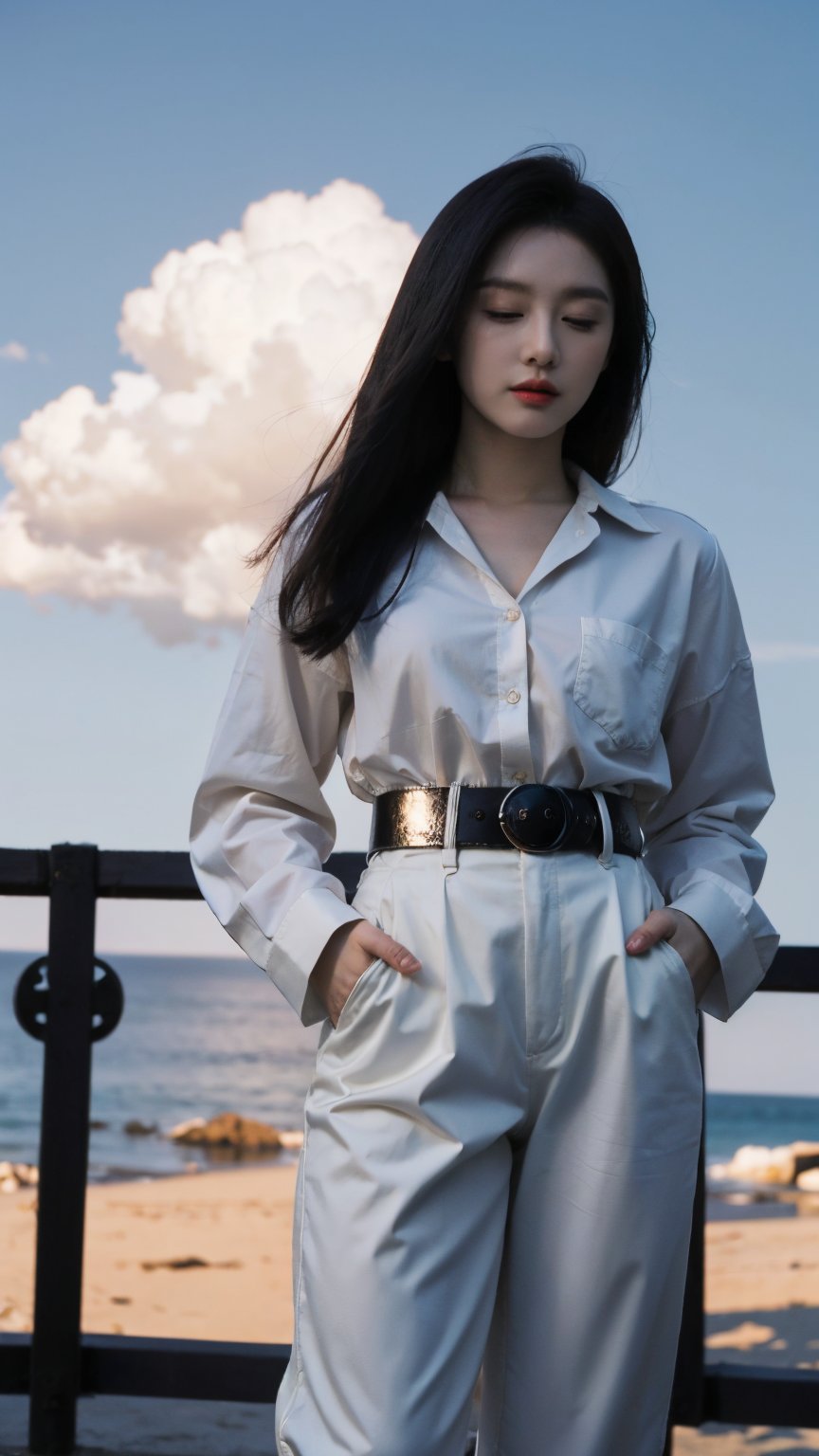 A lone figure stands framed against a brilliant blue sky, the sun casting a warm glow on her short, raven-black hair. She wears a crisp white collared shirt with long sleeves and black pants, cinched at the waist by a leather belt. Her lips are sealed, and her eyes remain closed as if lost in thought. One hand rests in the pocket of her pants, while the other remains tucked away, hidden from view. The camera captures her in a cowboy-inspired shot, showcasing her relaxed demeanor against the vast expanse of the cloud-dotted sky.