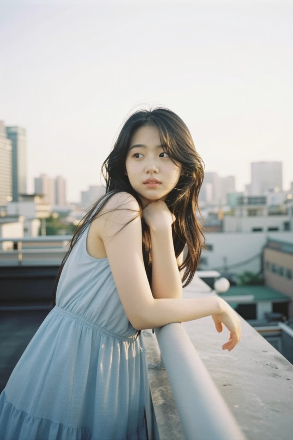 An alluring Korean woman in her 20s wearing a light summer dress (light blue,  flowing),  leaning casually against a rooft...