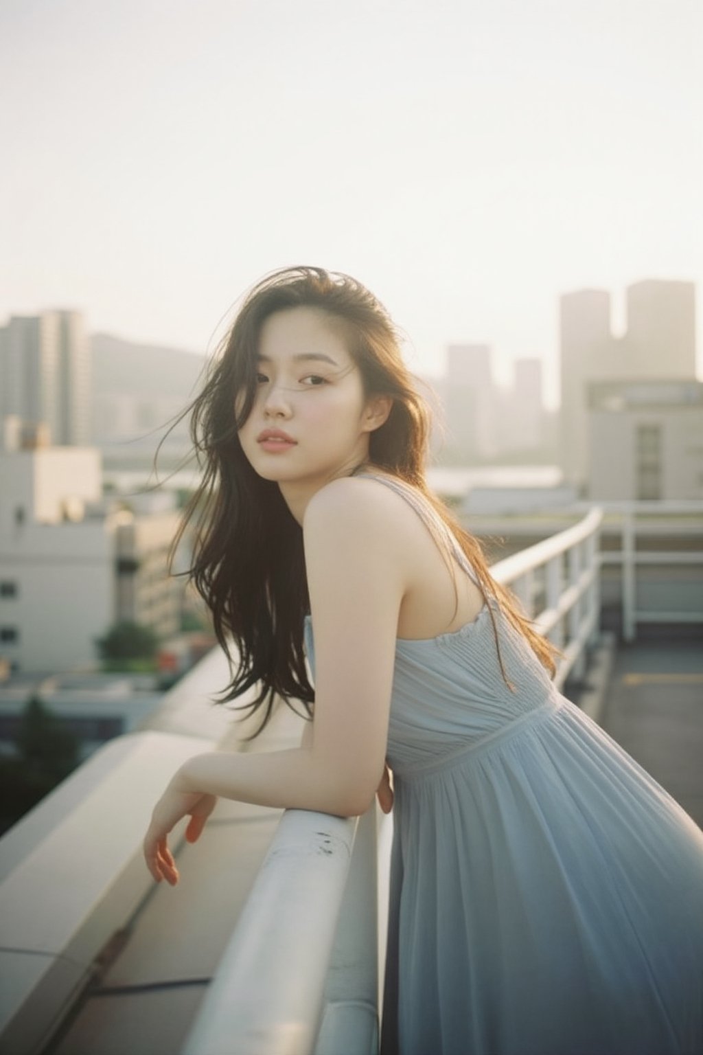 An alluring Korean woman in her 20s wearing a light summer dress (light blue,  flowing),  leaning casually against a rooft...
