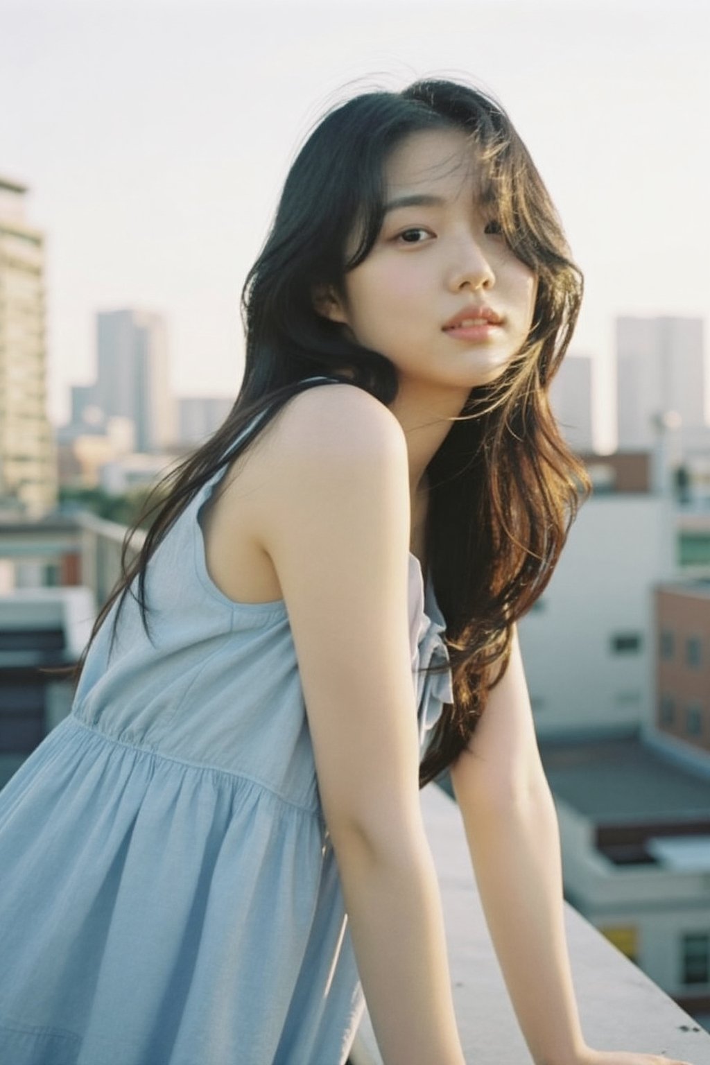 An alluring Korean woman in her 20s wearing a light summer dress (light blue,  flowing),  leaning casually against a rooft...