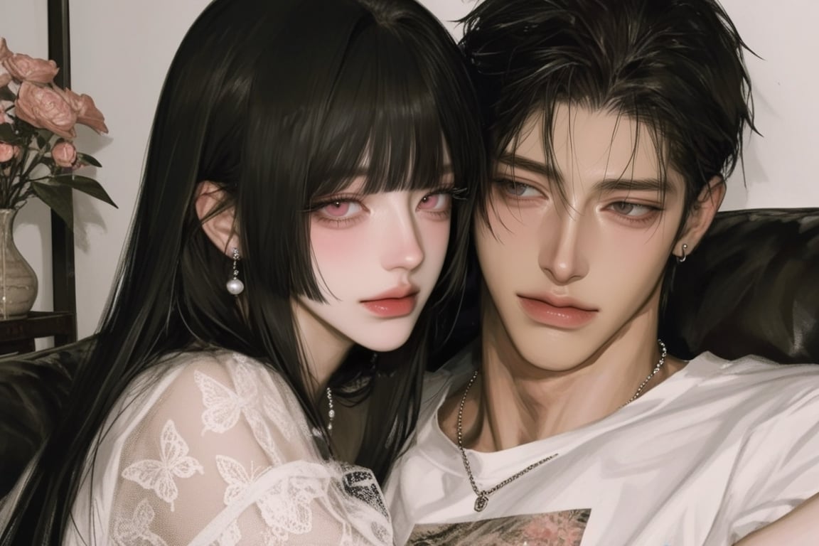 A beautiful man and woman in a fit elegant clothes,  couple in love,  the man is hugging the woman. They are sitting on so...