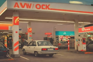 aw0k euphoric style, a car in a gas station 
