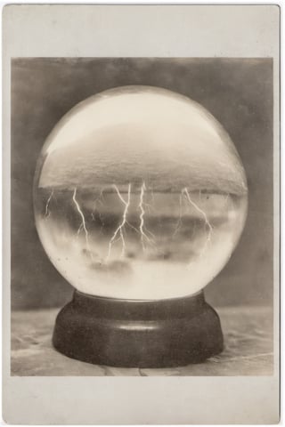 Photograph of a thunderstorm in a glass orb