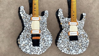 rock_2_img, rock image, rock art, rock, one stone electric guitar shape fully made out of rocks, full view, High detail, rock, best quality, (just a shape, not a guitar you stupid AI)