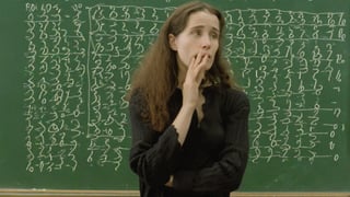 Le penseur de Rodin but a woman, in front of diffcult math problem on a blackboard
