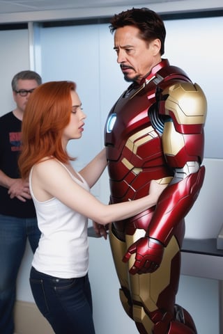 Tony Stark  working with Natasha Romanoff (Scarlet Johansson) testing an Iron Man armour