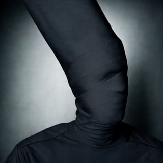 a photo group tree man portrait man in military black cloth, face covered with black cloth, black bg