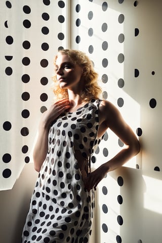 girl looks out of a window, in the style of conceptual light sculptures, polka dots, imaginative prison scenes, fashion photography, opaque resin panels, luminous shadows, close-up